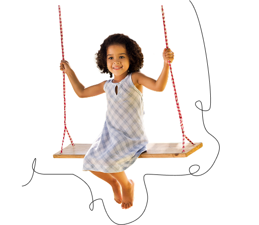 Young girl sitting on a swing